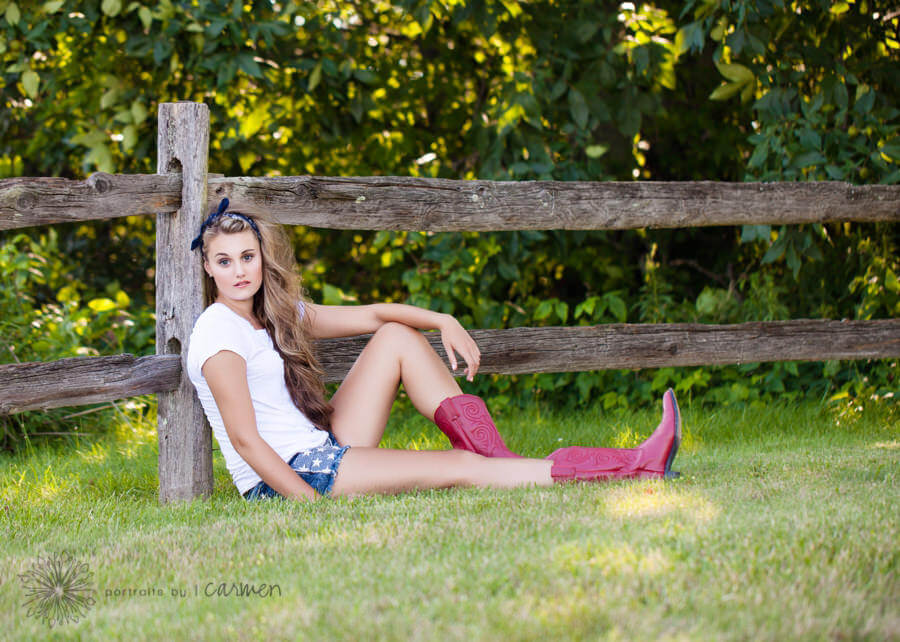 Senior Portraits Columbus Ohio girl with cowboy boots fence