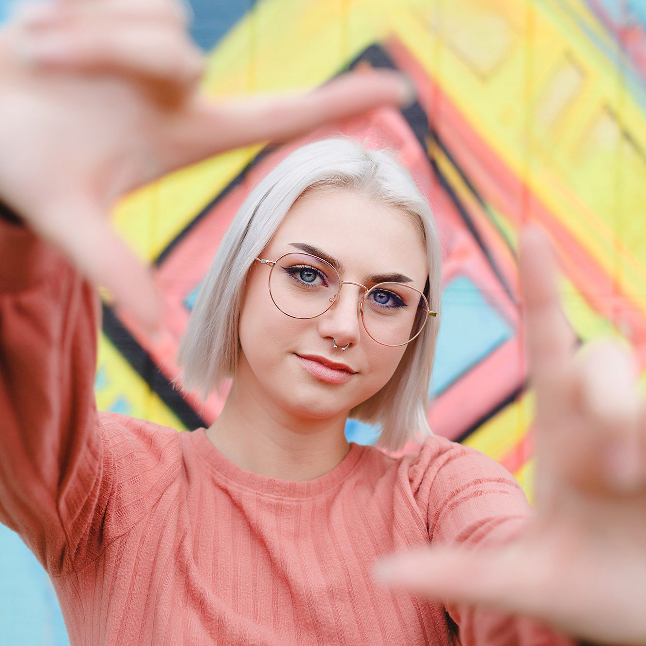 creative senior photoshoot of girl with glasses on near Columbus, OH