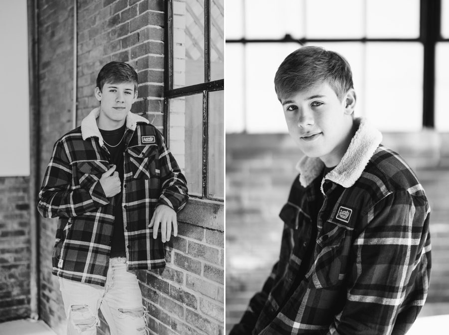 Black and white Grove City Senior Pictures of Alex in plaid jacket with wool neckline