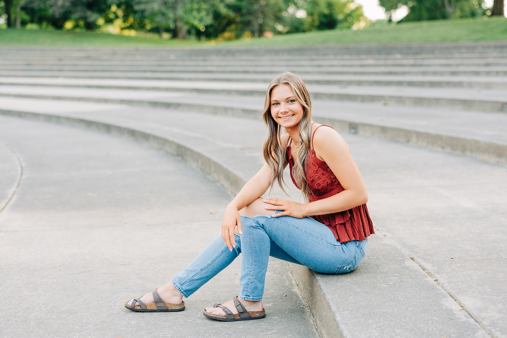 Carmilla Jane Photography captures Jaylyn of Westfall High School sitting on rows of stairs
