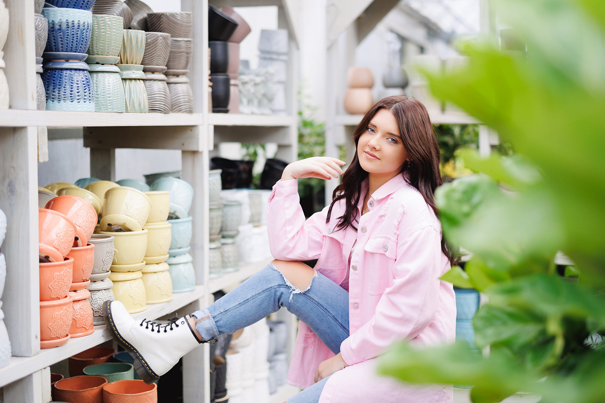 Carmilla Jane captured Laurel casually posing with pottery at Groovy Plants Ranch for her Grove City senior pictures